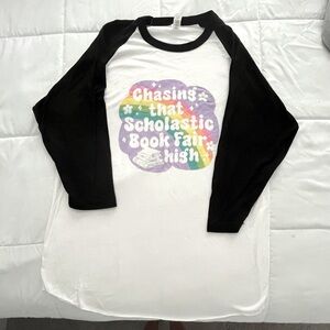 Black & White Raglan Shirt “ Chasing That Scholadtic Book Fair High”. Lg. NWOT